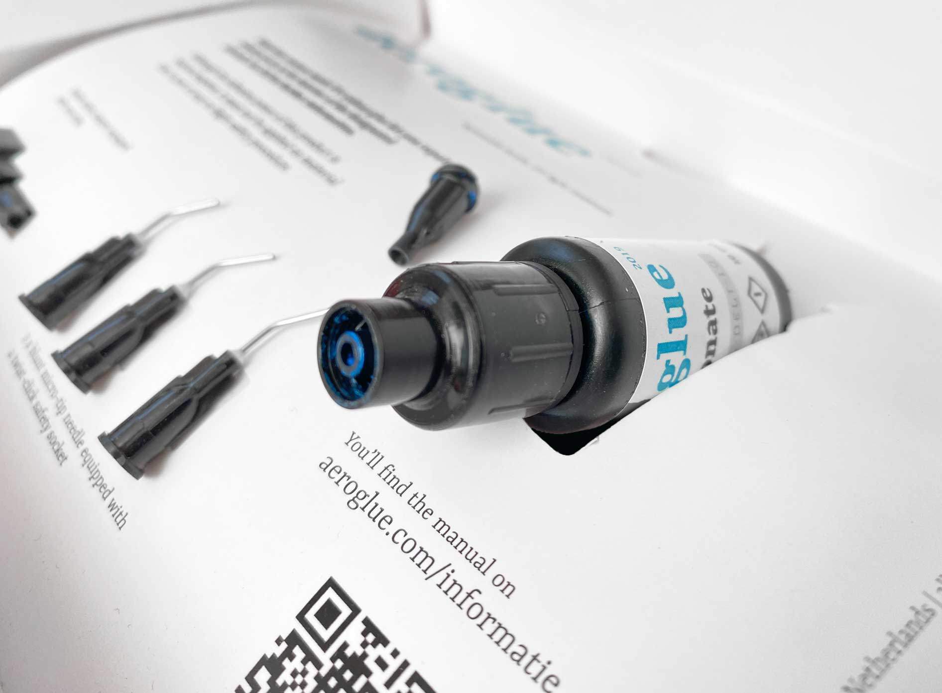 Aeroglue UV glue box bottle (detail)