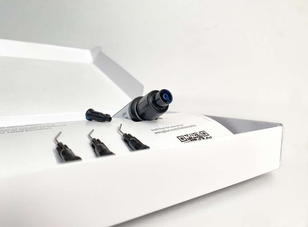 Aeroglue UV glue box bottle detail